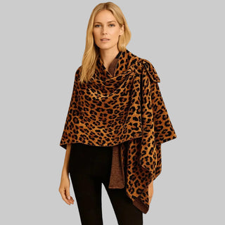 Woman in a leopard print poncho shawl