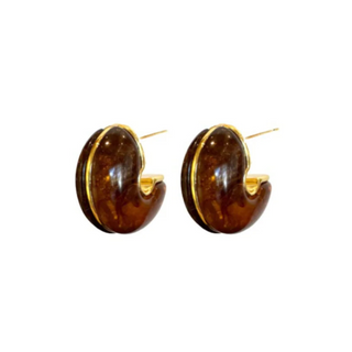 Pair of brown hoop earrings with gold accents on a white background