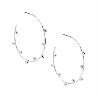 Silver hoop earrings with small beads on a white background