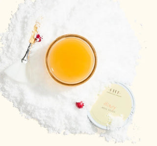 Open jar of Honey Heel Glaze with application brush in holiday snow - Annie Jack TX