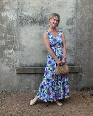 Woman in a maxi floral lavender dress