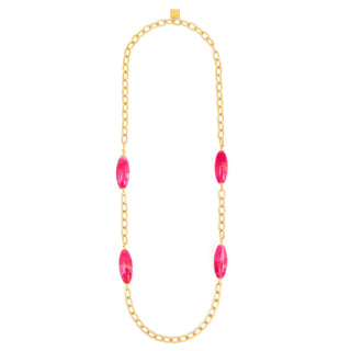 Gold necklace with pink beads on a white background