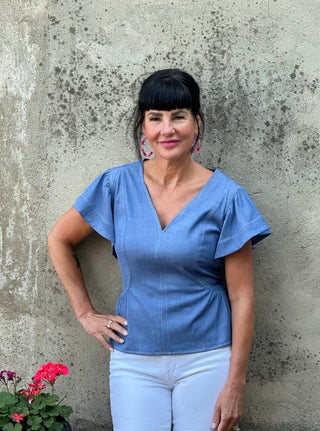 Flutter Sleeve Chambray V - Neck Peplum Top - Annie Jack TX