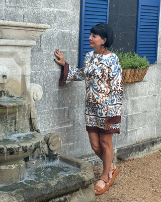 WOMAN BY FOUNTAIN