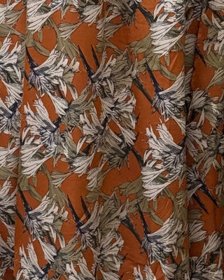 Zoom in of the floral pattern on the dress shown