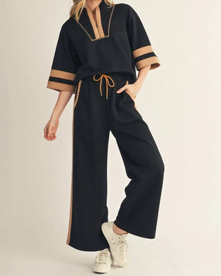 Black drawstring wide leg pant with camel stripe trim