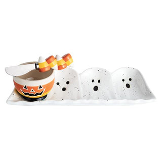 Halloween-themed ceramic set with ghost-shaped bowls and candy corn design on a white background